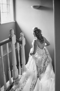 walking down the stairs by mk wedding photography
